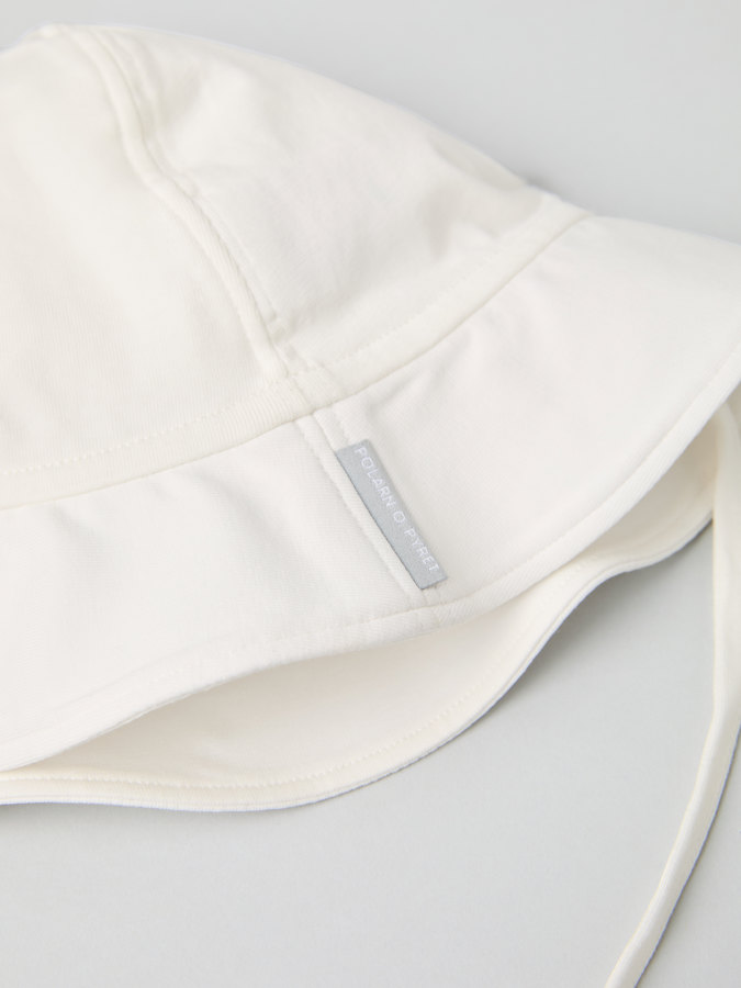 Trikå solhatt enfärgad