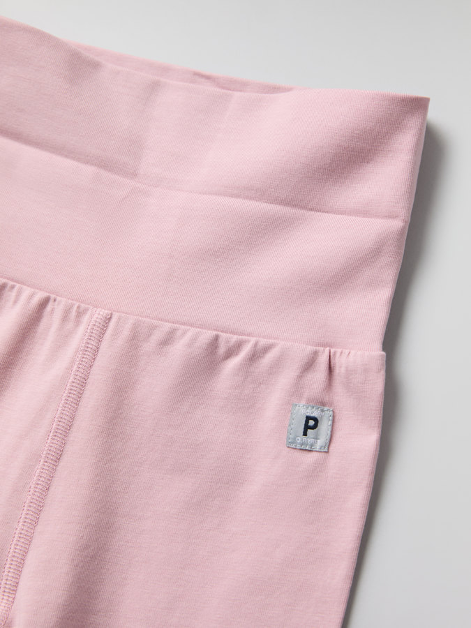 Byxa med nedvikbara muddar