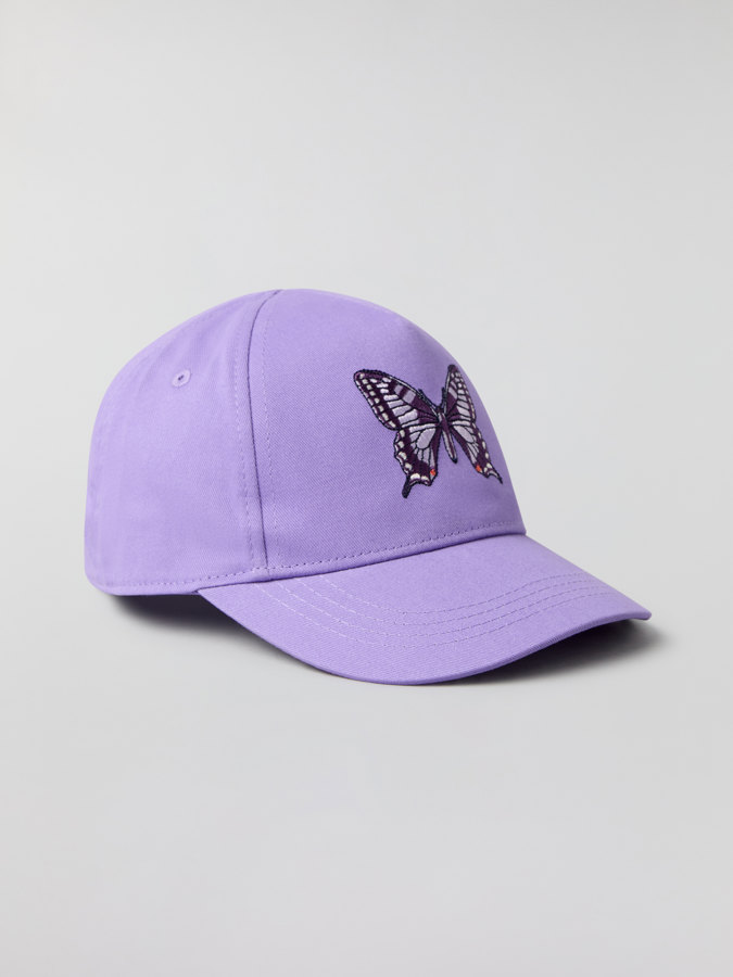 Keps med applikation Keps med applikation