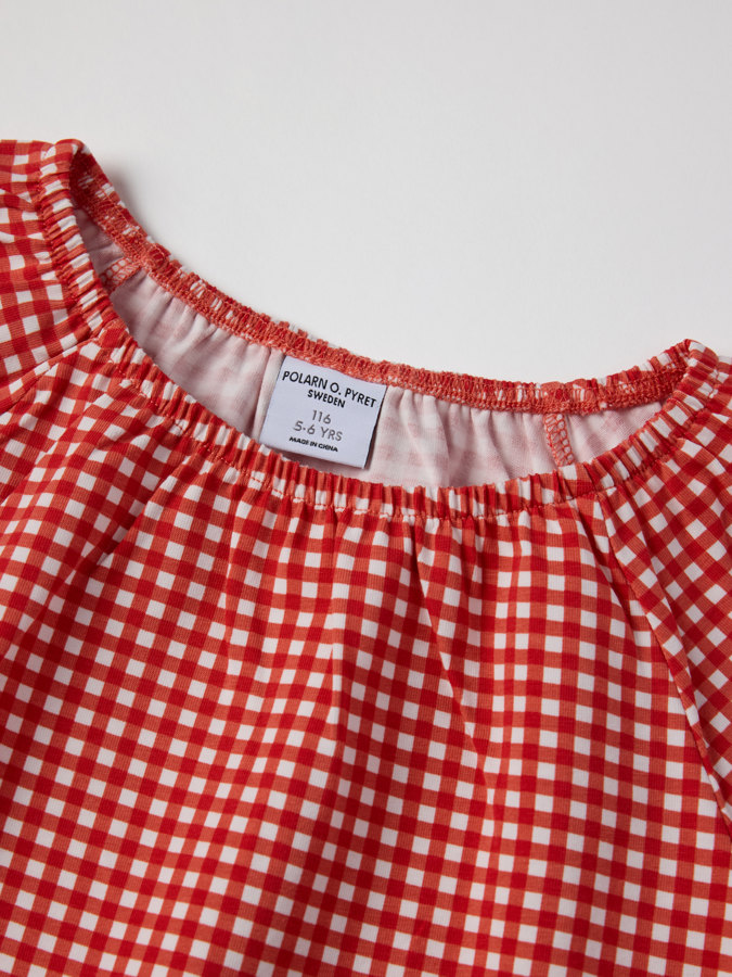 Topp med puffärmar rutig